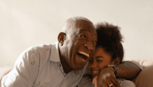 senior man with his granddaughter